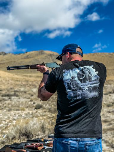 Back of Man wearing Bow Hunting T-shirt in Black.