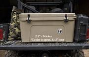 2.5 inch Hook Line Sasquatch die cut sticker featuring a fisherman and sasquatch, applied to a camping cooler.