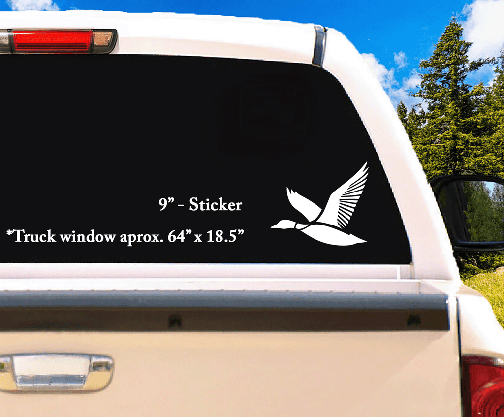 Mid-size 9" white vinyl decal featuring a flying duck displayed on a truck’s back window—built for visibility and clean style.