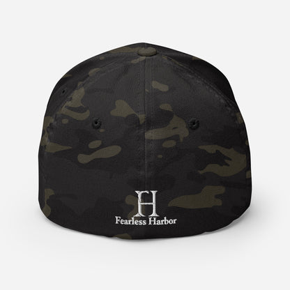 Back of Big Buck FlexFit Hat in Multicam Black, with white embroidery of FH logo.