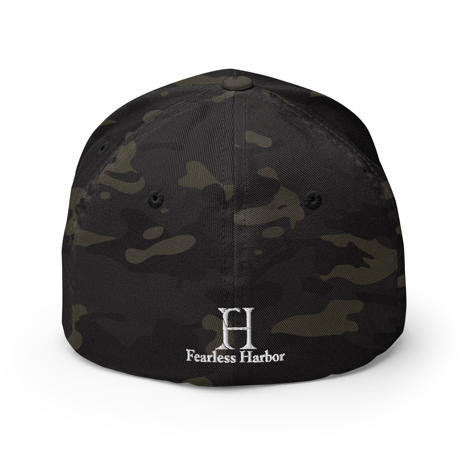 Back of Buck FlexFit Hat in Multicam Black, with white embroidery of FH logo.