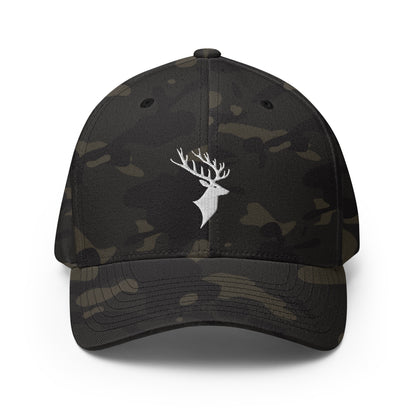 Front of Buck FlexFit Hat in Multicam Black, with white deer head embroidery on front.