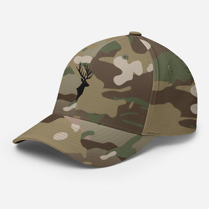 Left Front of Buck FlexFit Hat in Multicam Green, with black deer head embroidery on front.