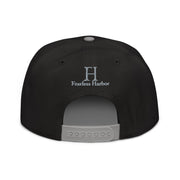 Back of Buck Snapback Hat in black, with grey snap enclosure and embroidered FH logo.