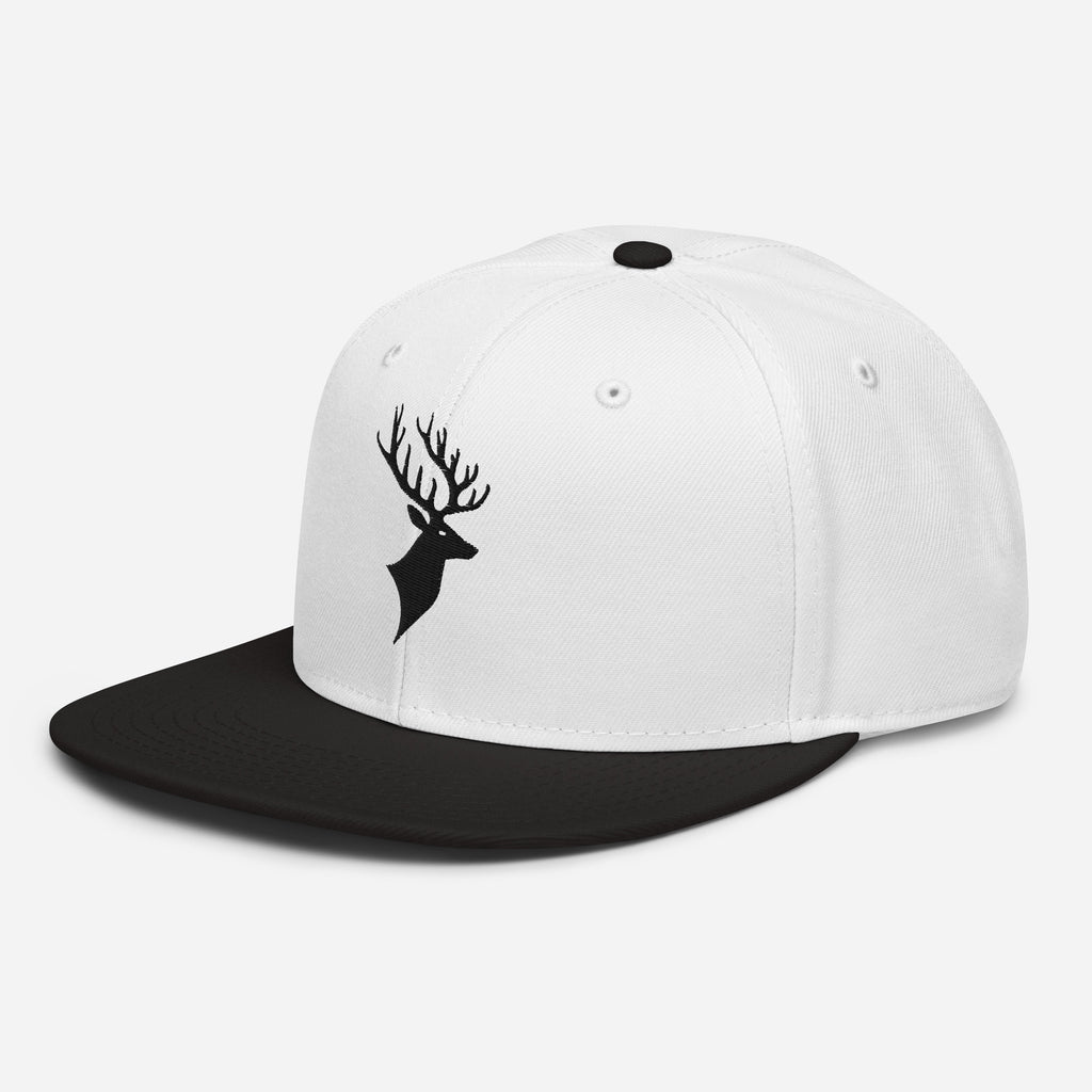 Left Front of Buck Snapback Hat in white with black visor, and black Deer head embroidery on front.
