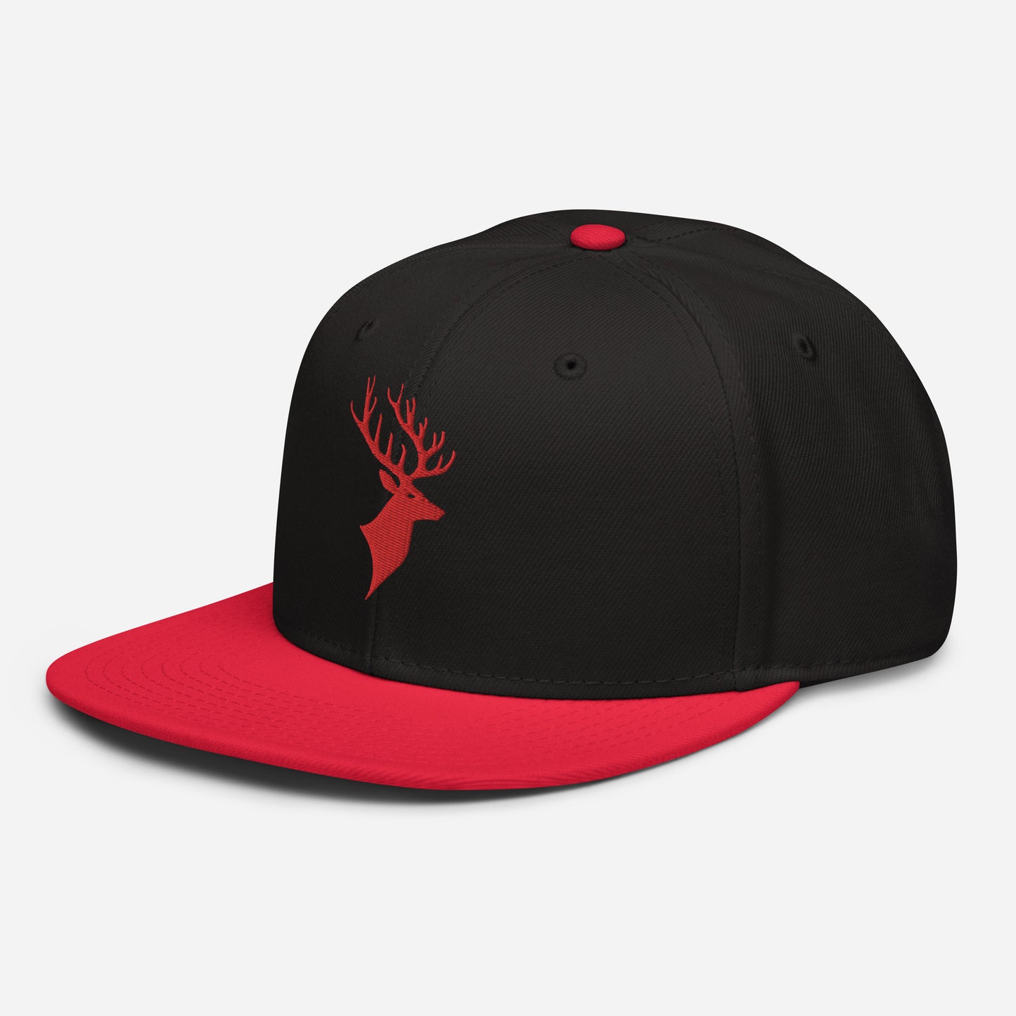 Left Front of Buck Snapback Hat in Black with red visor, and red Deer head embroidery on front.