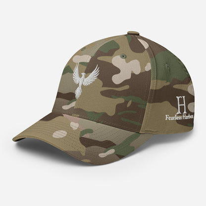 Left Front of Camo FlexFit Hat in Multicam Green with grey phoenix logo embroidery on front and FH logo on left side.