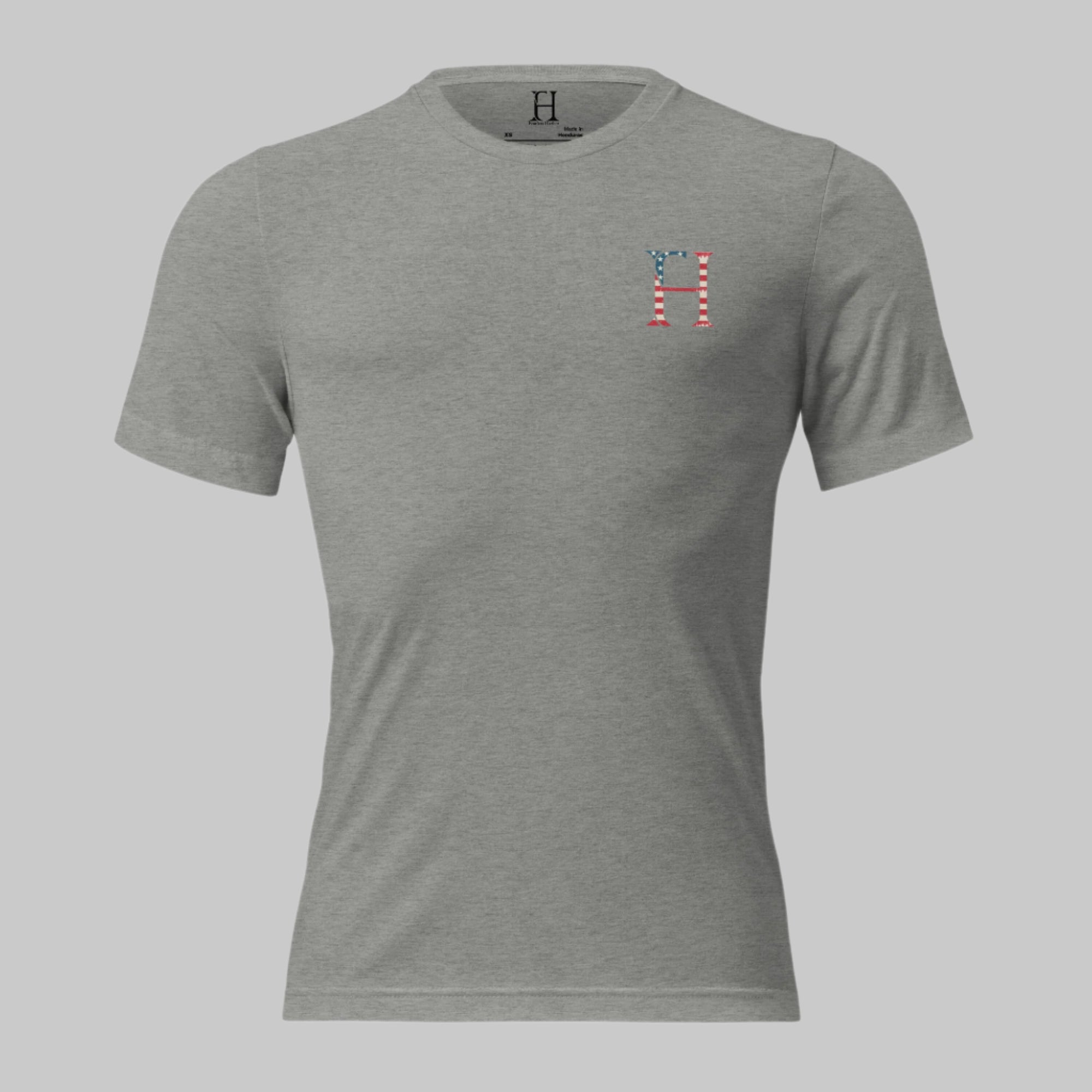 Front of athletic grey tee with clean Fearless Harbor FH logo on the left chest—subtle, sharp, and iconic.