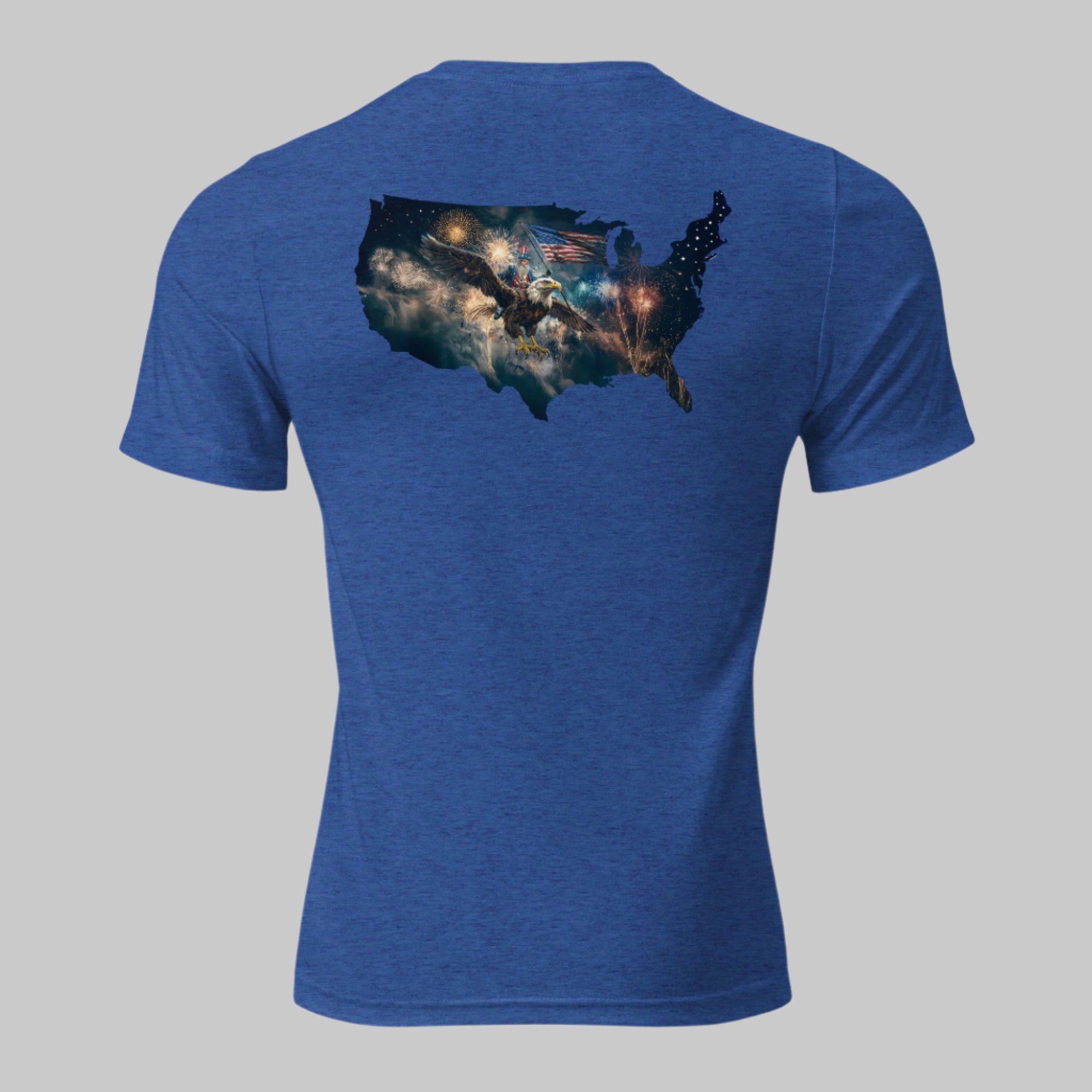 Back of royal blue tee with striking Fourth of July art—Uncle Sam on a bald eagle, American flag raised, fireworks filling the sky.