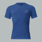 Front of royal blue tee featuring a small FH emblem on the left chest, understated and crisp.