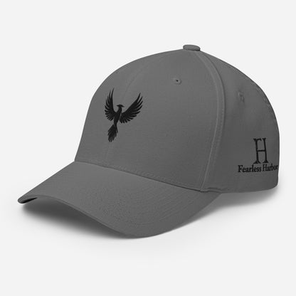 Left Front of Fearless Harbor FlexFit Hat in grey with black phoenix logo embroidery on front and FH logo on left side.