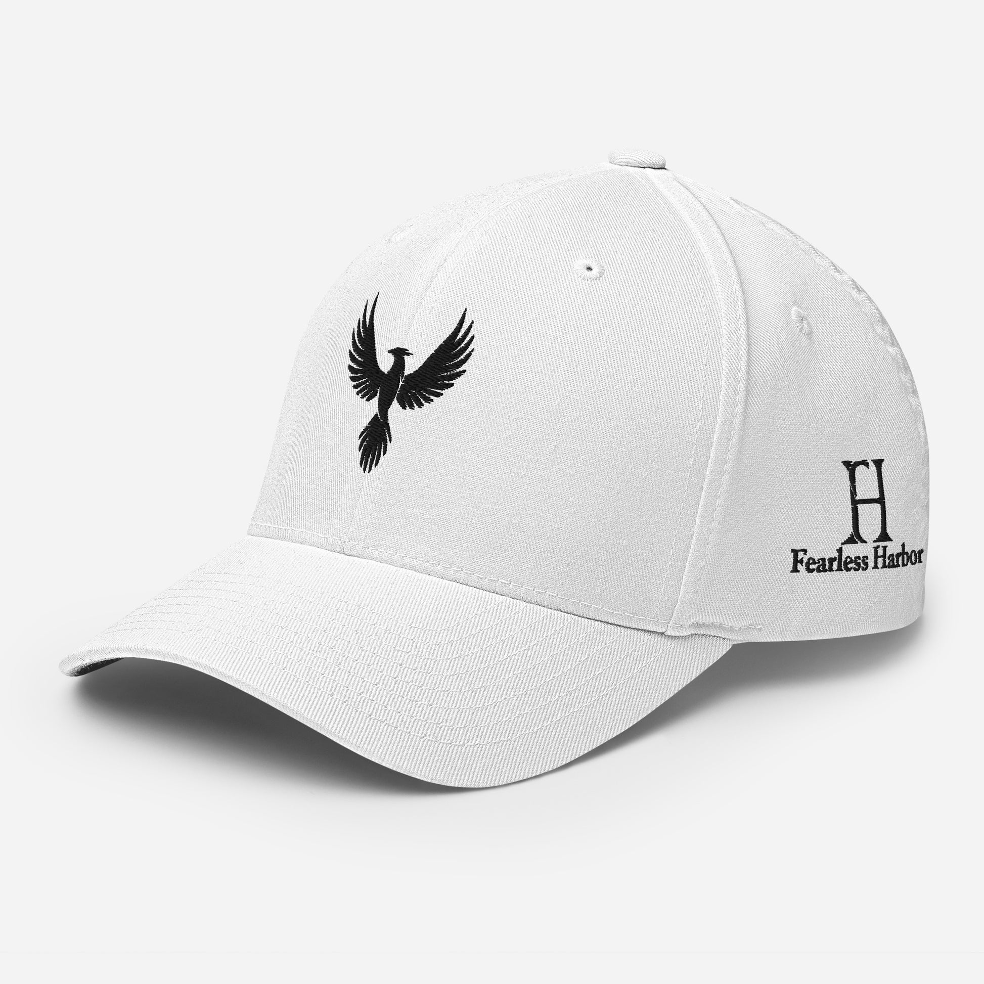 Left Front of Fearless Harbor FlexFit Hat in White with black phoenix logo embroidery on front and FH logo on left side.