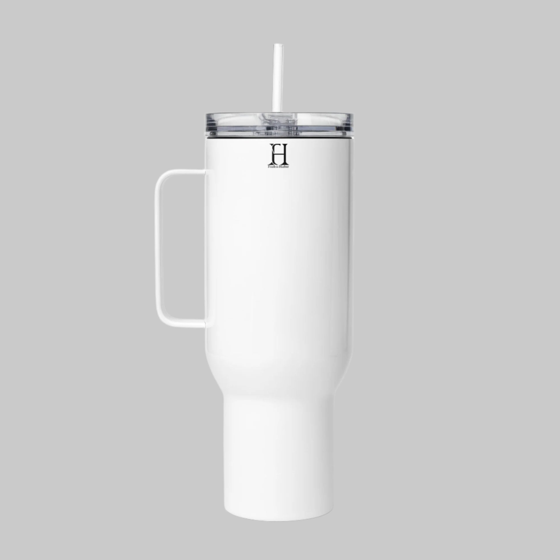 Right side of 40 oz Mug with Straw in White with FH logo in black near lid and the text Fearless Harbor.