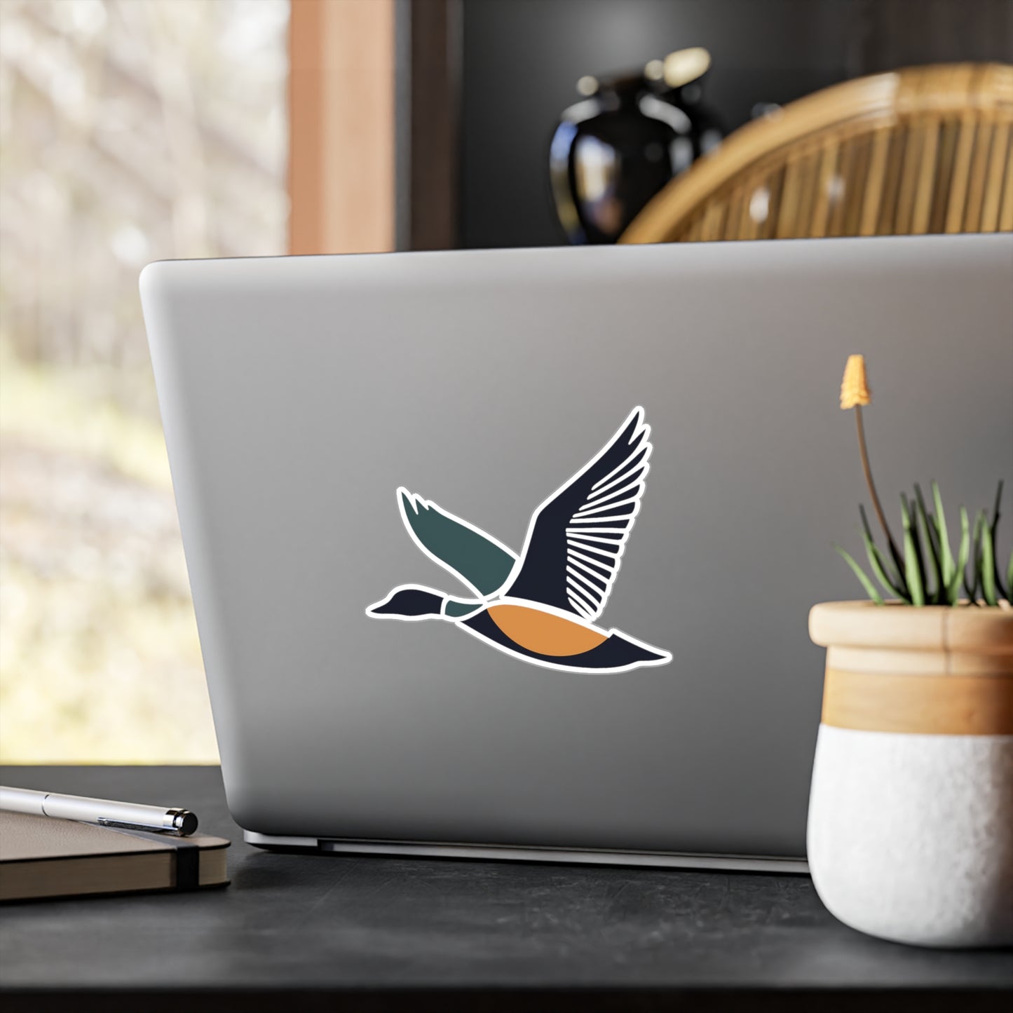 6x8 Flying Duck Vinyl Sticker displayed on a laptop.