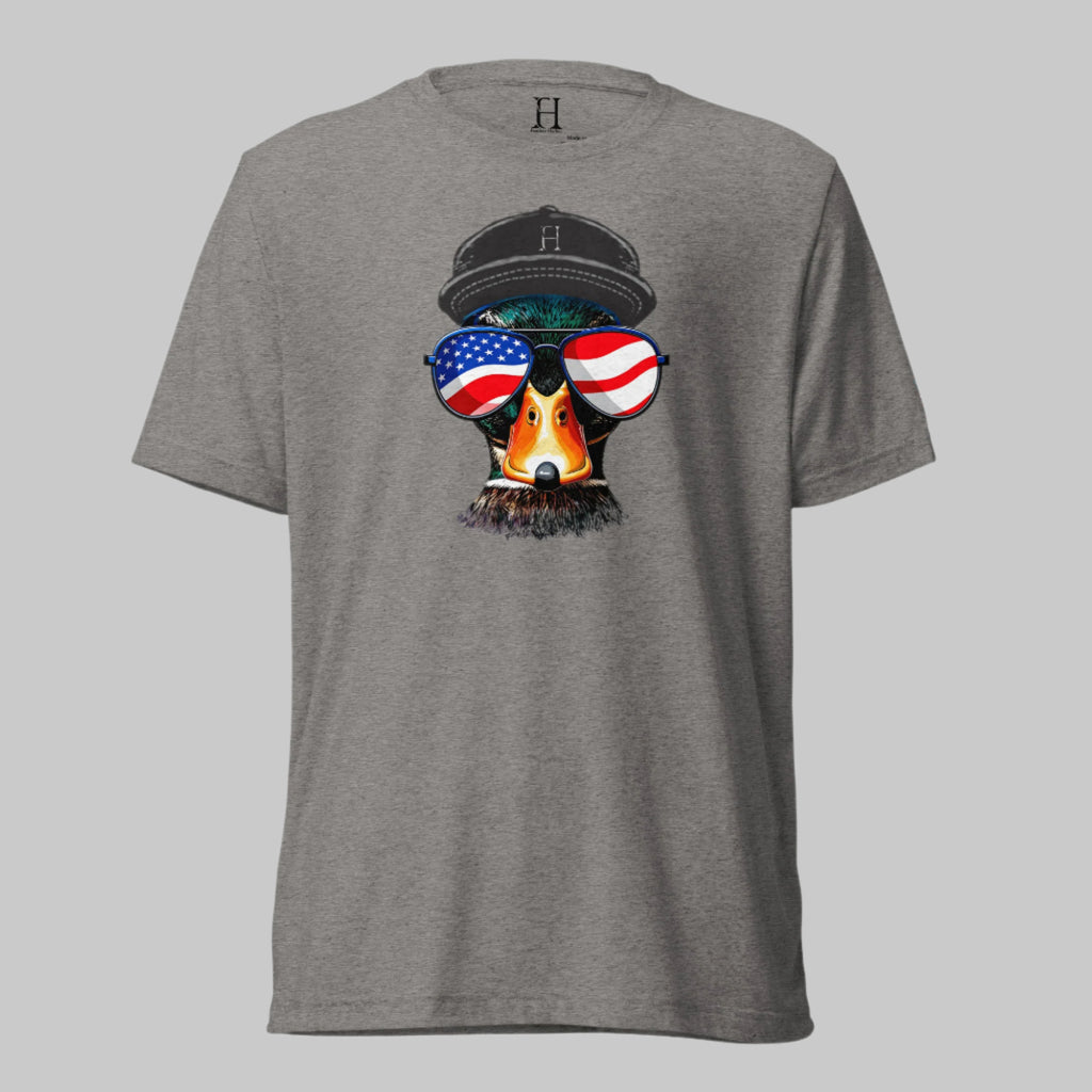 Grey triblend t-shirt featuring a vintage-style mallard head in flag shades and a patriotic hat—made for those who know where they stand.