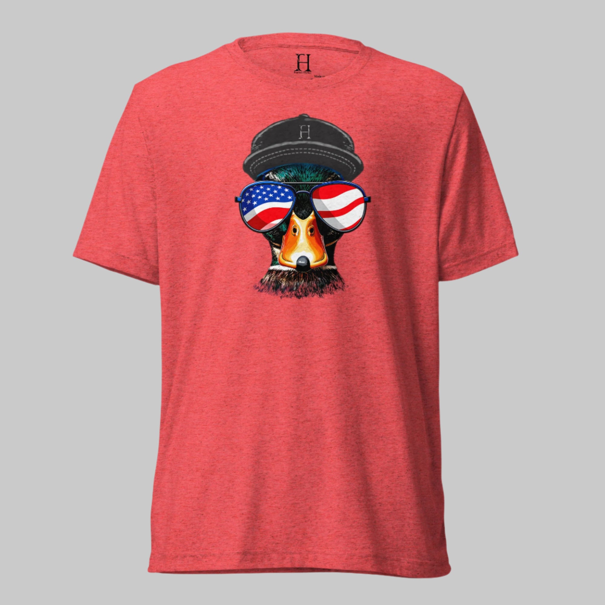 Red triblend t-shirt with a standout mallard in flag shades and star-spangled hat—worn by those who don’t hesitate to show where they land.