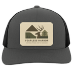 Graphite Black trucker hat showing Fearless Harbor buck patch on front panel.
