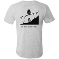 Back view of the Men’s He Was Here First Bigfoot Hunting Tee in Athletic Heather showing a large graphic of Bigfoot standing on a ridge above a climbing bowhunter with He Was Here First text.