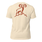 Back view of men’s heather natural graphic tee highlighting full curl bighorn sheep on a mountain ridge.