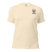 Front view of men’s heather natural tee with the Fearless Harbor logo at left chest in lifestyle outdoor context.