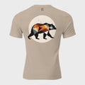 Back of Fearless Harbor Bear Edition T-Shirt in Tan with black, orange, and green bear design and FH logo near collar.