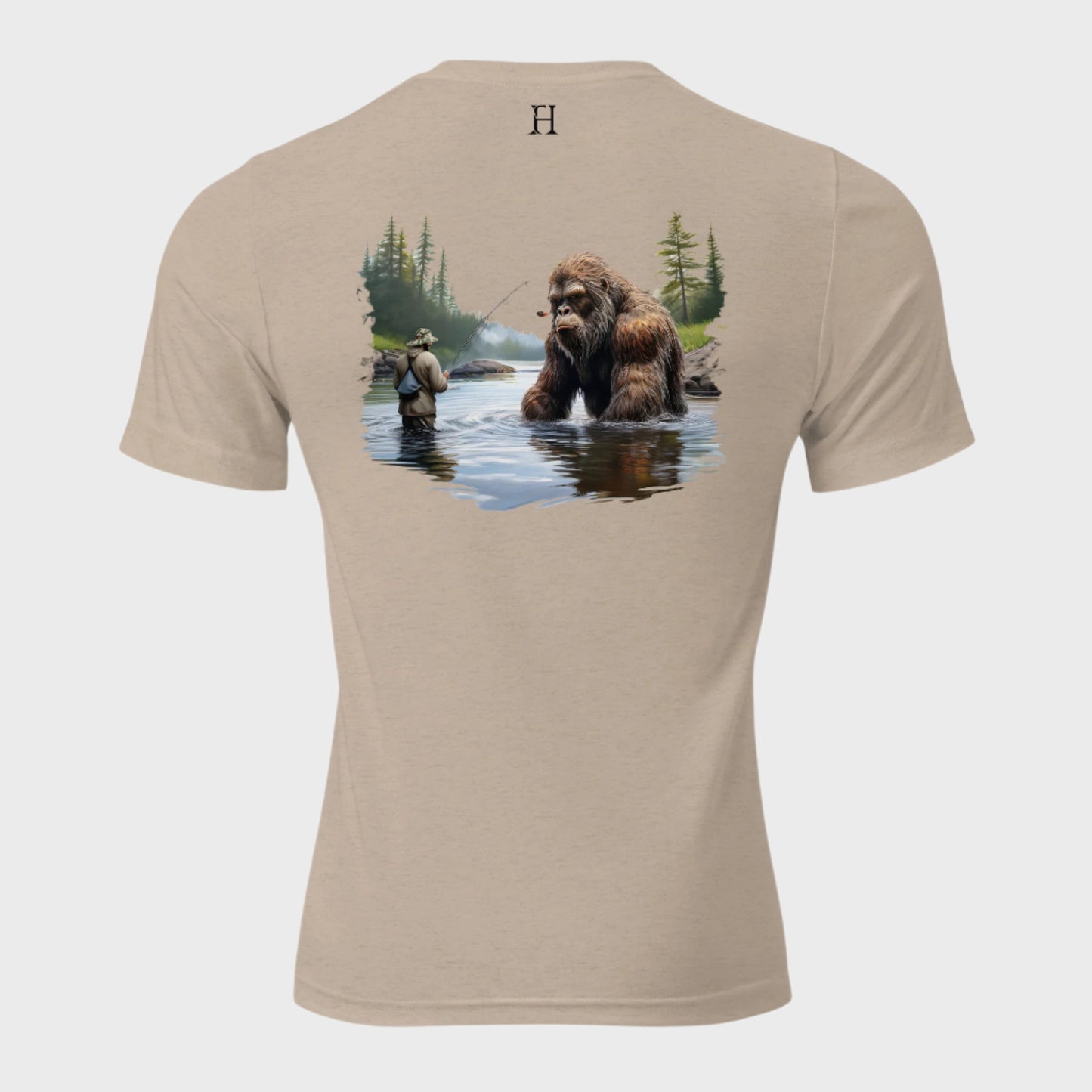 Back of Bigfoot Big Catch T-shirt in Tan with design of a fisherman and hook caught on Bigfoot sitting in lake.