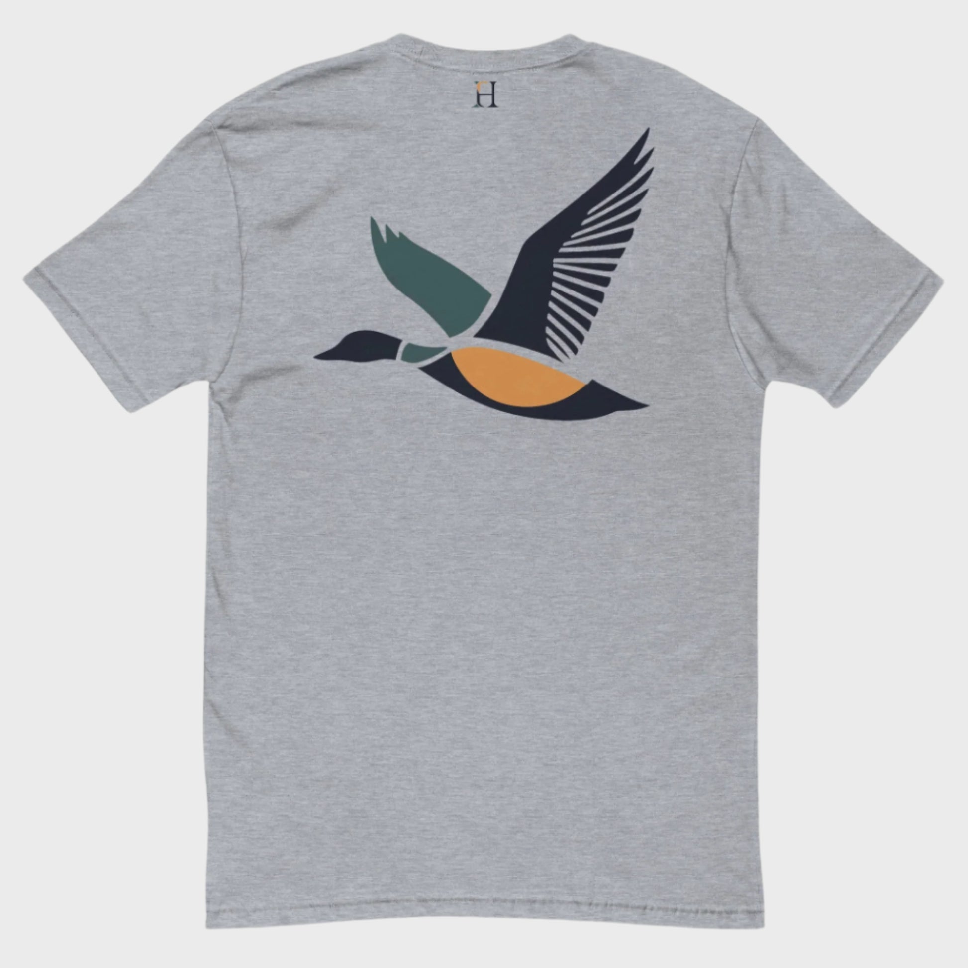 Back of Drake Edition T-Shirt in grey with dark blue, yellow, and green flying duck design and FH logo near collar.