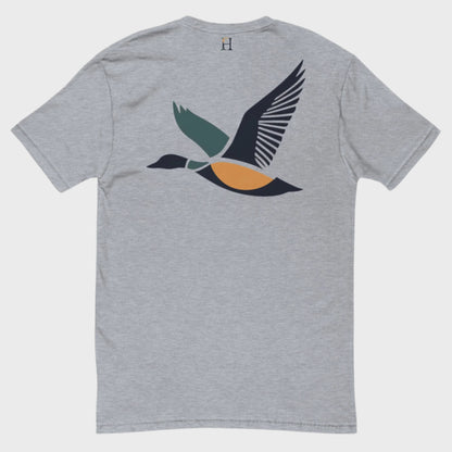 Back of Drake Edition T-Shirt in grey with dark blue, yellow, and green flying duck design and FH logo near collar.