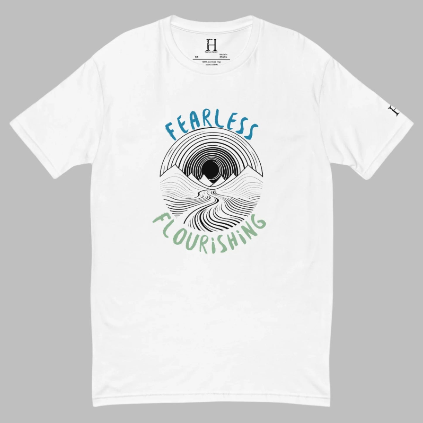 Front of white T-shirt with black outline of a river flowing through mountains and the words Fearless and Flourishing.