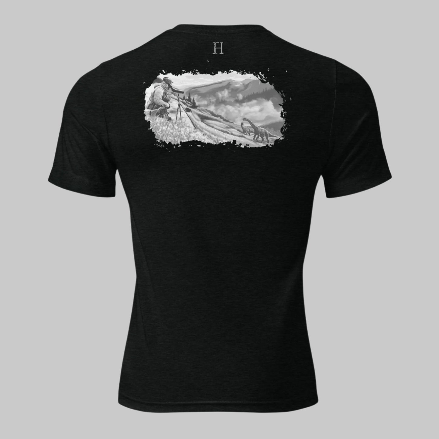 Back Hunting T-Shirt for Big Game Hunters in Black with image of a Hunter Glassing Dinosaurs.