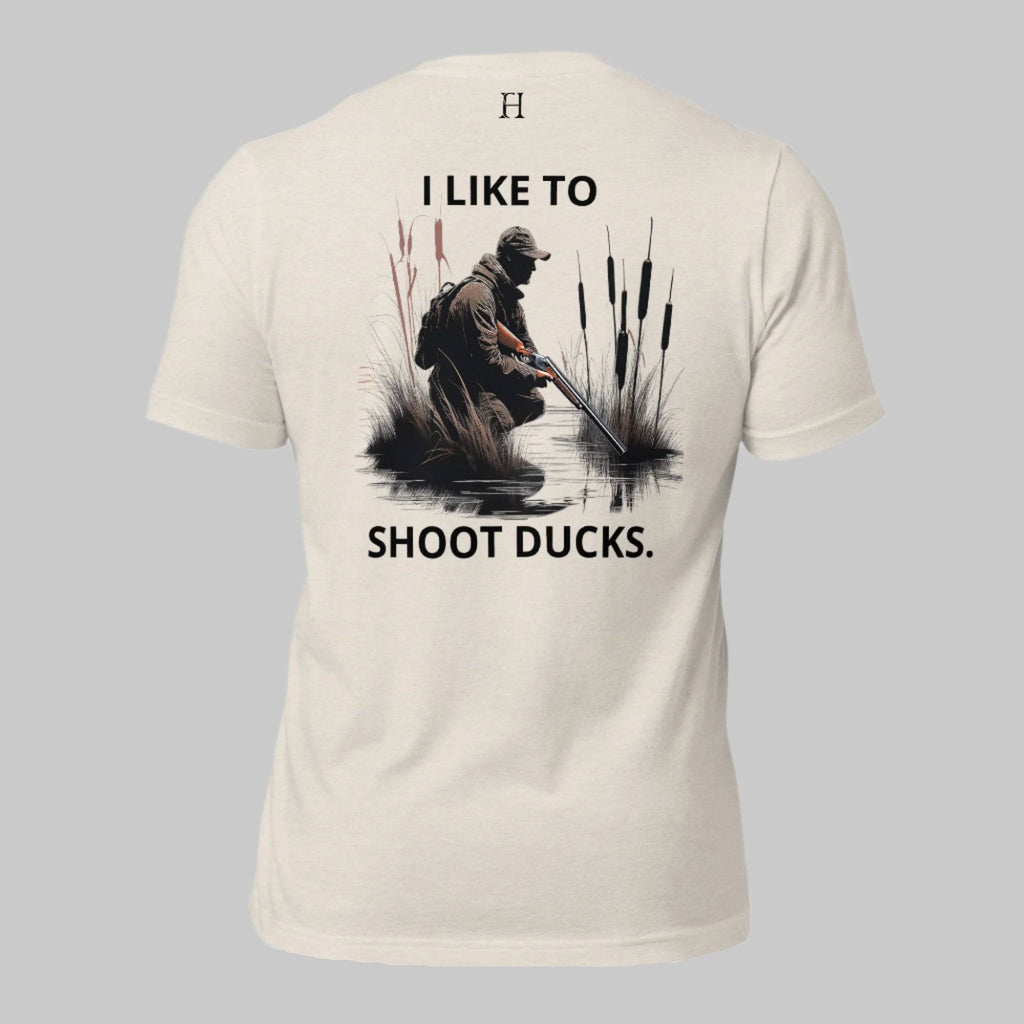 Back of I Like Ducks T-Shirt in Dust, Duck hunter in the marsh design, with FH logo near collar.