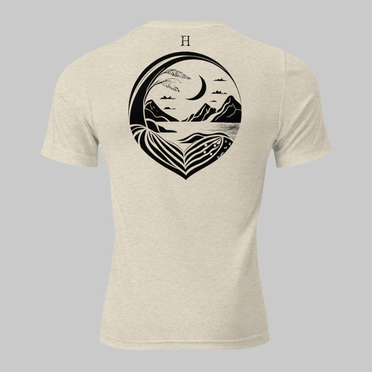 Back of Moon Harbor T-Shirt in Oatmeal with a scenic beach harbor at night design, FH logo at center top near collar.