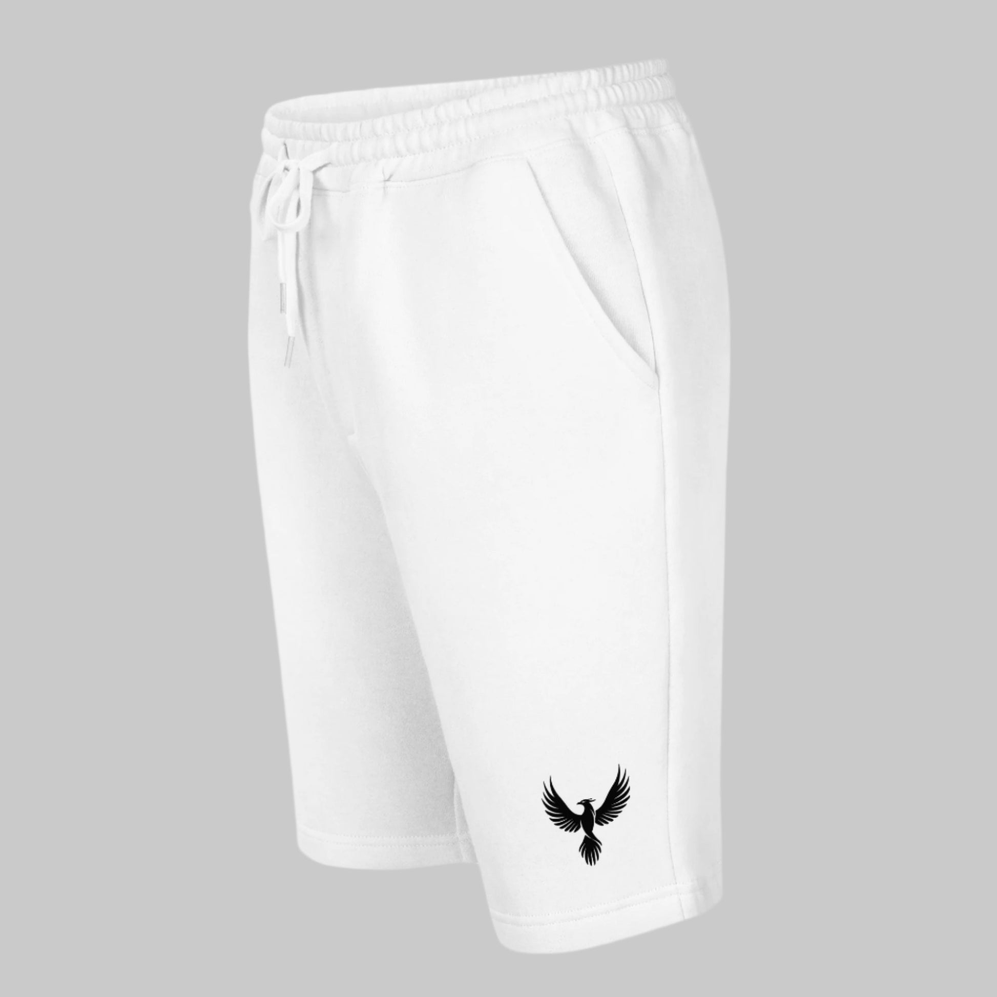 Front Left of Emblem Fleece Shorts in White, with a phoenix design on lower right pant leg in black.