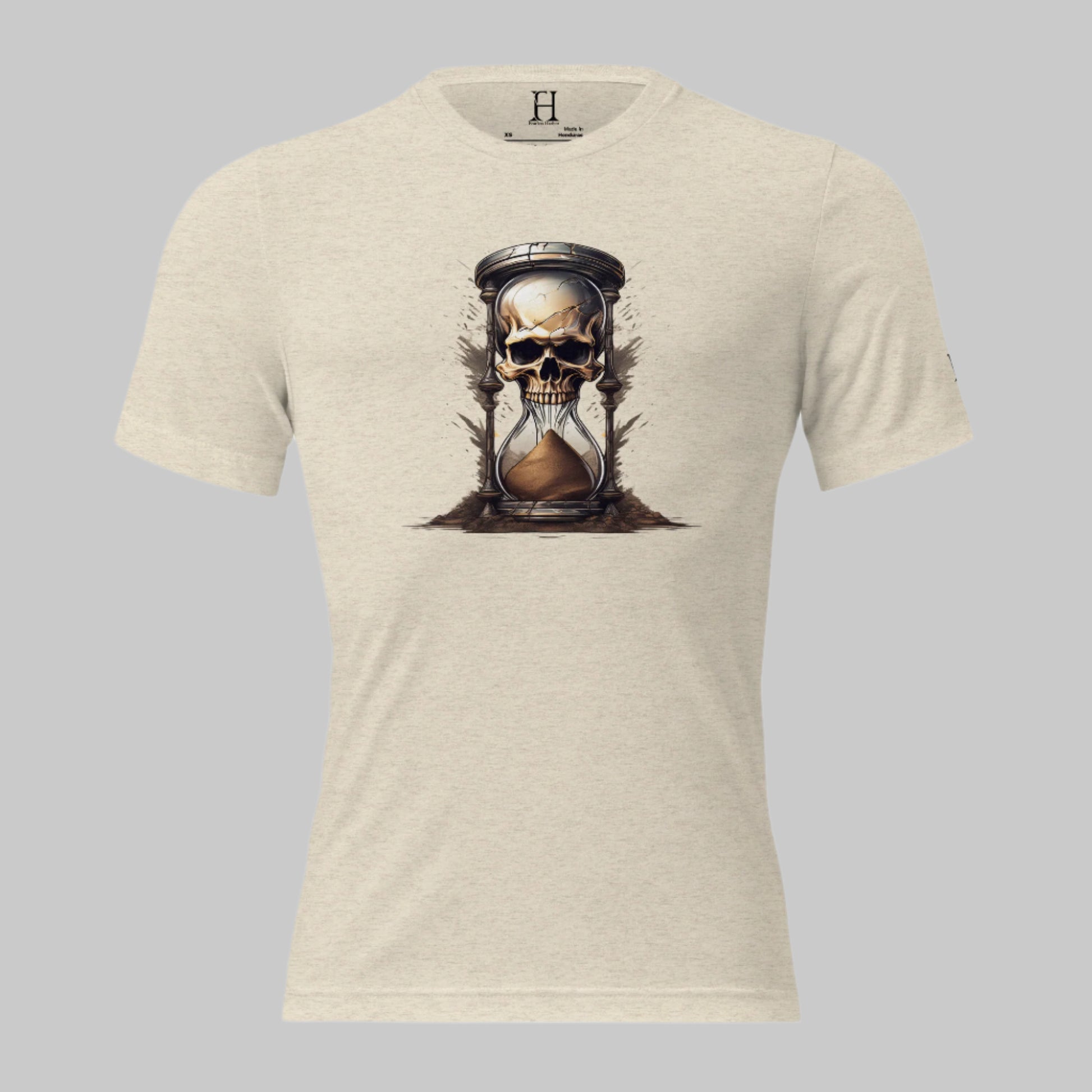 Front of Race Against Time Triblend T-Shirt in Oatmeal with a sand of time hourglass made with a skull design.