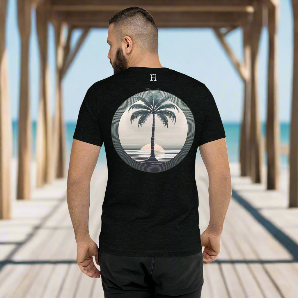 Back of Man wearing T-shirt in Black with Palm Tree Design.