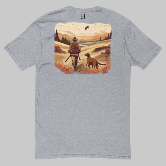 Back of Timeless Track Hunting T-Shirt in Grey, hunter and dog with flying pheasant design and FH logo near collar.