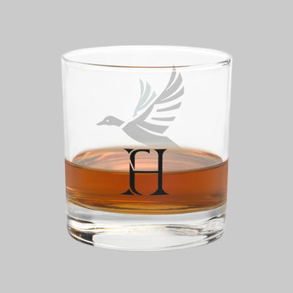 Right side of Drake Flight Rocks Whiskey Glass with Fearless Harbor Logo Design.