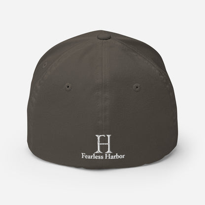 Back of Skybound Drake FlexFit Hat in Dark Grey, with the text Fearless Harbor in white.