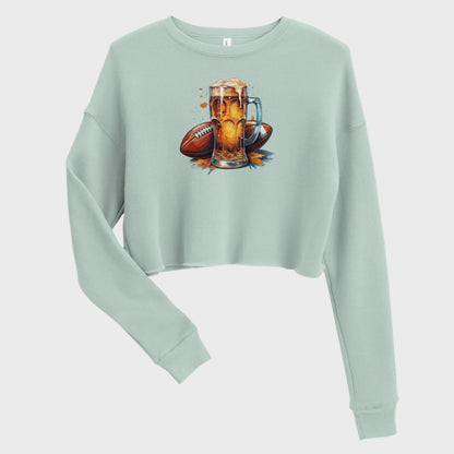 Front of Autumn Tailgate Fleece Crop Sweatshirt in Dusty Blue with Fall time football and beer design. 