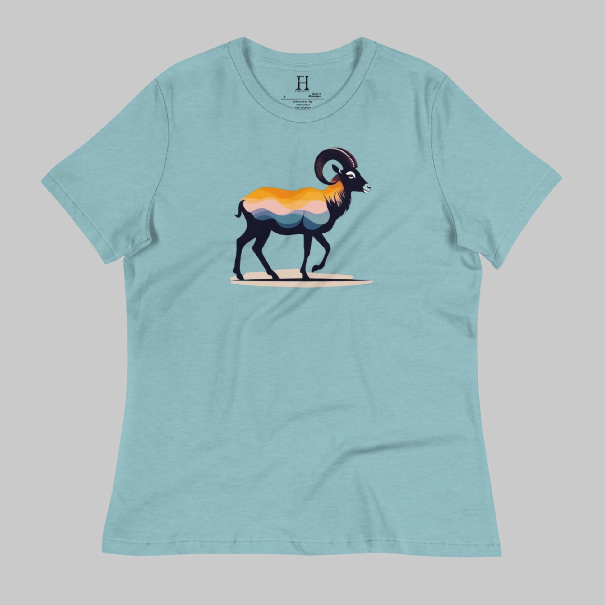 Front of Big Horn T-shirt in Blue Lagoon with a Bighorn Sheep Silhouette design.