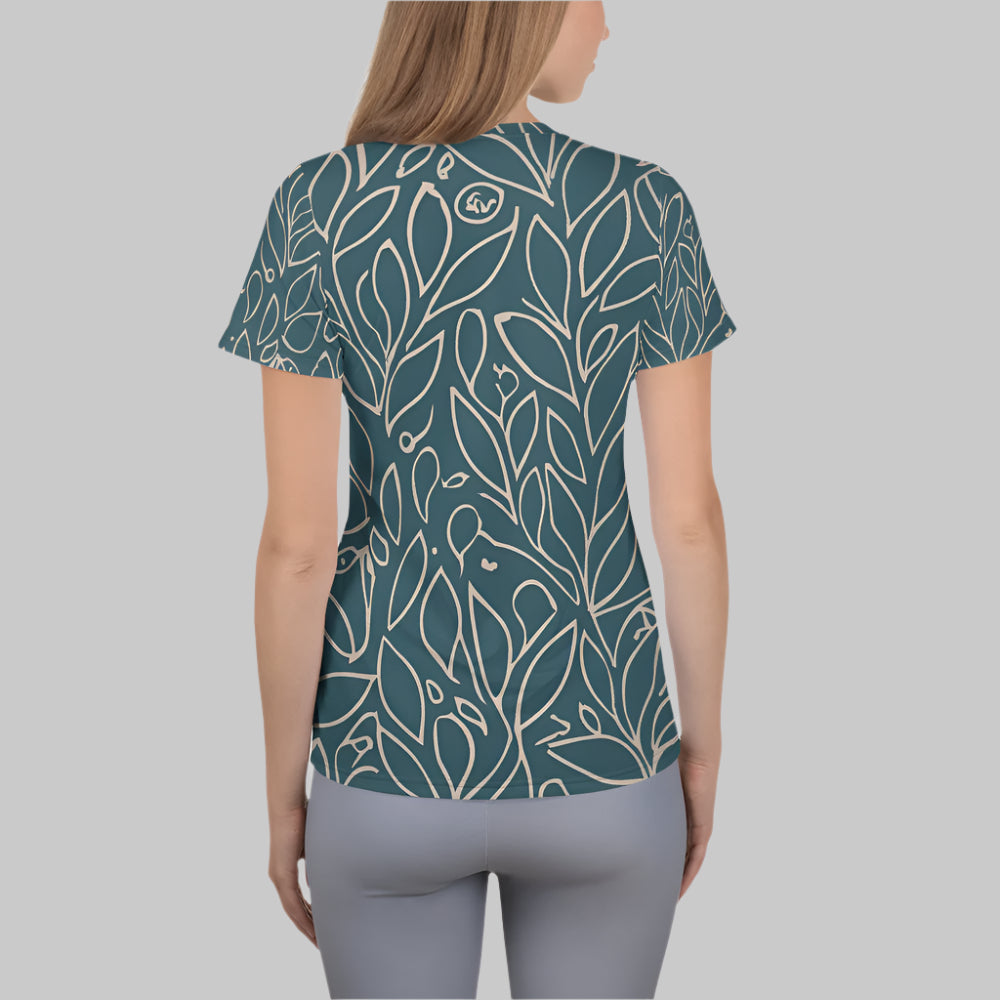 Back of Woman wearing Fearless Growth Athletic T-Shirt in Slate Teal with a floral flower pattern.