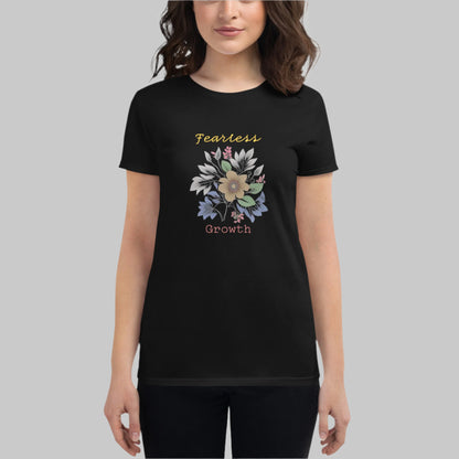 Front of Woman wearing Fearless Growth T-Shirt in Black with a floral flower plant graphic, and the text Fearless Growth. 