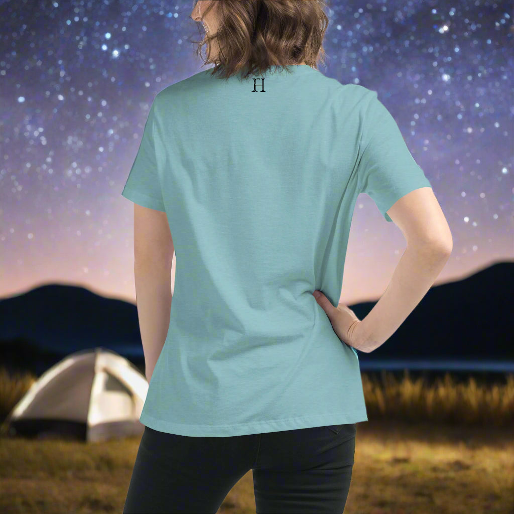 Back of Woman wearing Wild Moose T-Shirt in Blue Lagoon, with FH logo in black in center near collar.