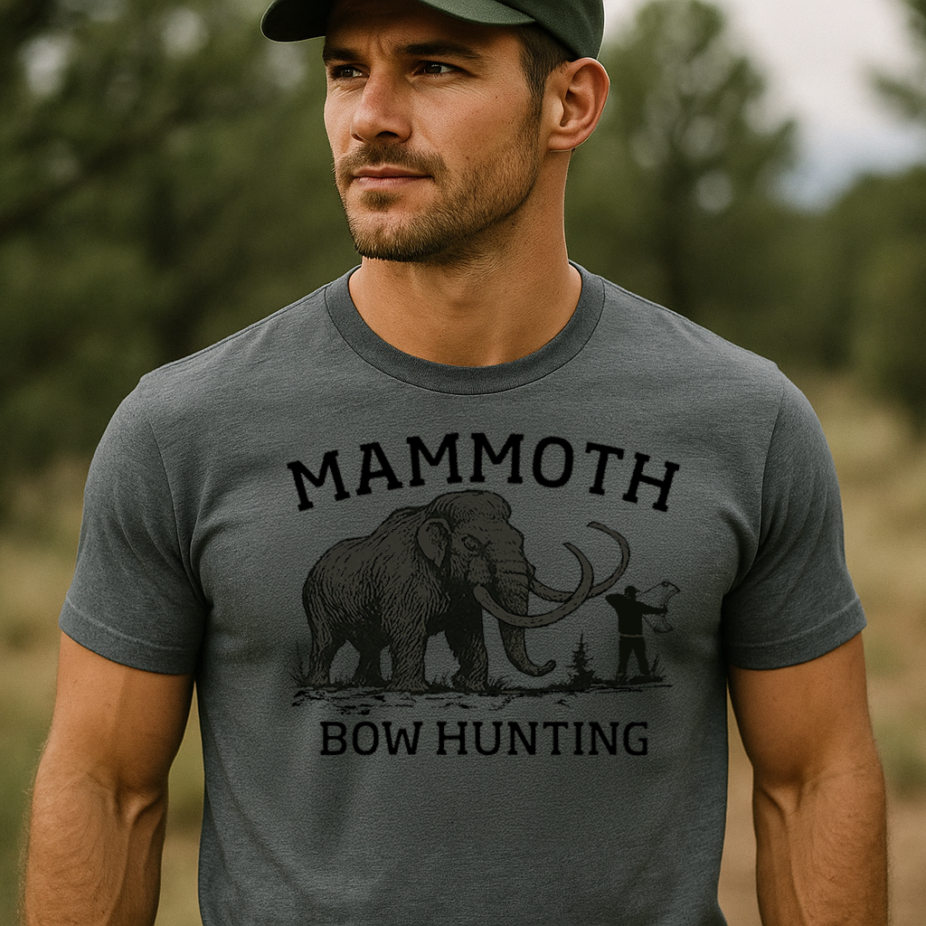 Hunter wearing Fearless Harbor Men’s Mammoth Bow Hunting Tee in blue in the wilderness, highlighting outdoor style.