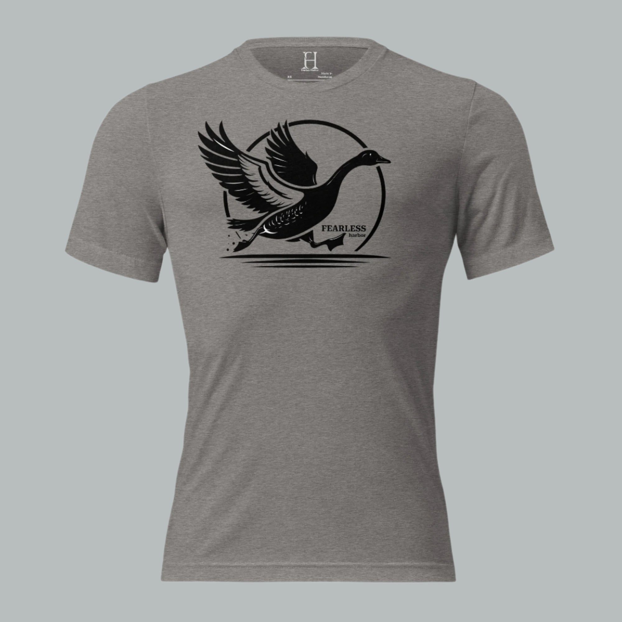 Front view of Fearless Harbor Men's Charging Goose Tee in Grey, featuring dynamic goose design for hunters.