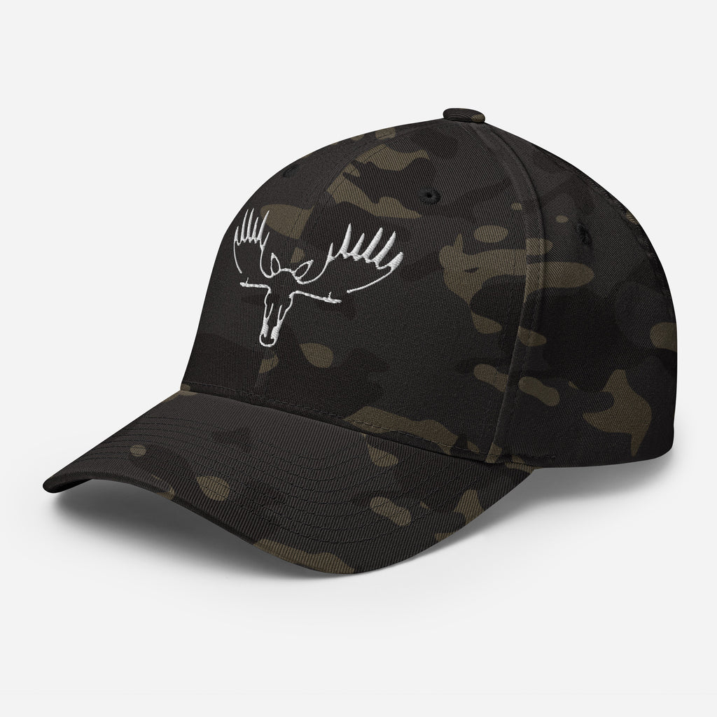 Left front view of Fearless Harbor Moose Logo FlexFit Hat in multicam black with bold moose logo, perfect for hunters and outdoor lifestyle.