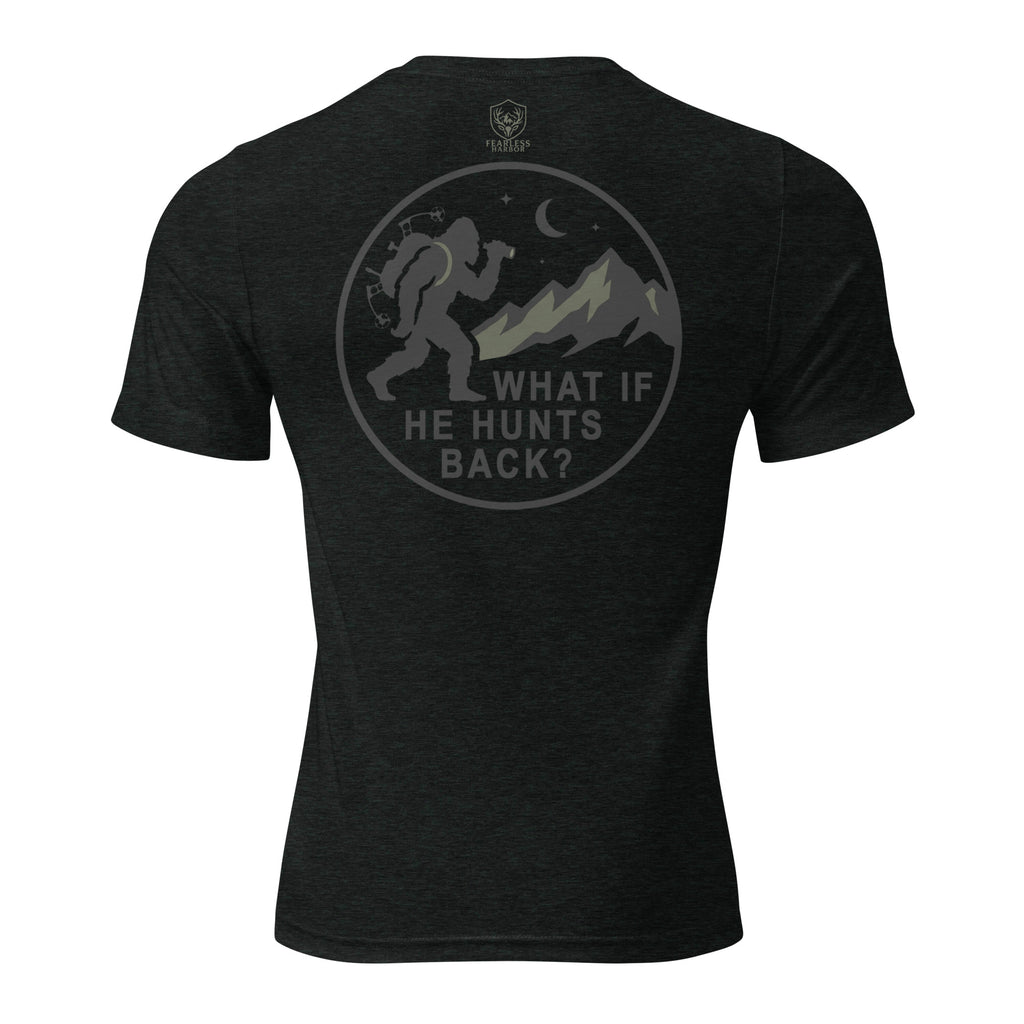 Mens charcoal black triblend bigfoot hunting shirt showing What If He Hunts Back back graphic with bigfoot silhouette