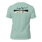 Men's Drift Line Goose Tee in Heather Prism Dusty Blue showing geese drifting over marsh horizon with mirrored reflections