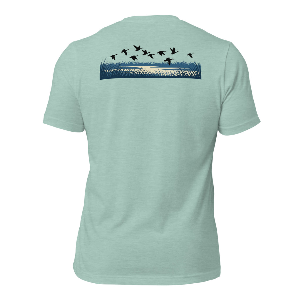 Men's Drift Line Waterfowl Tee in Heather Prism Dusty Blue showing ducks drifting across a marsh horizon scene