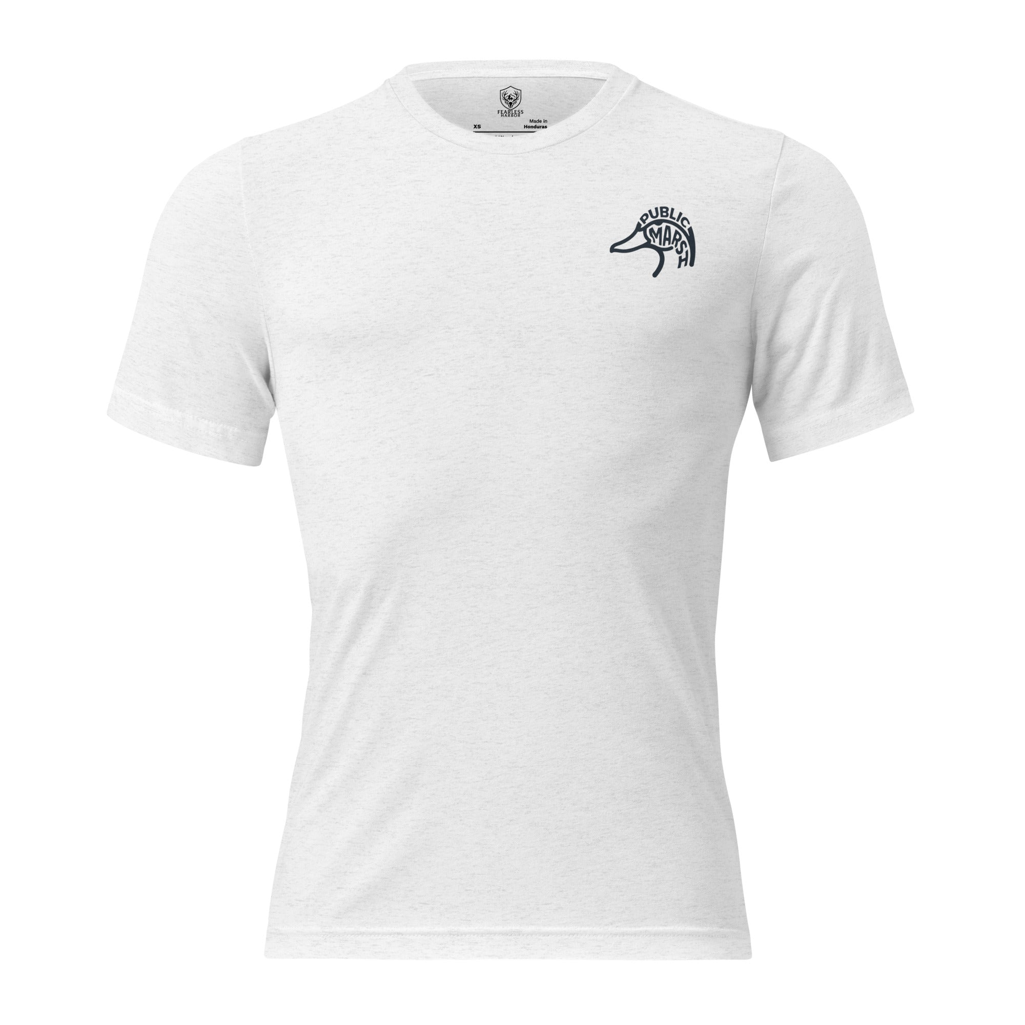 Man outdoors wearing the Men's First Light Crew Waterfowl Tee in Solid Black Triblend front view with Public Marsh emblem